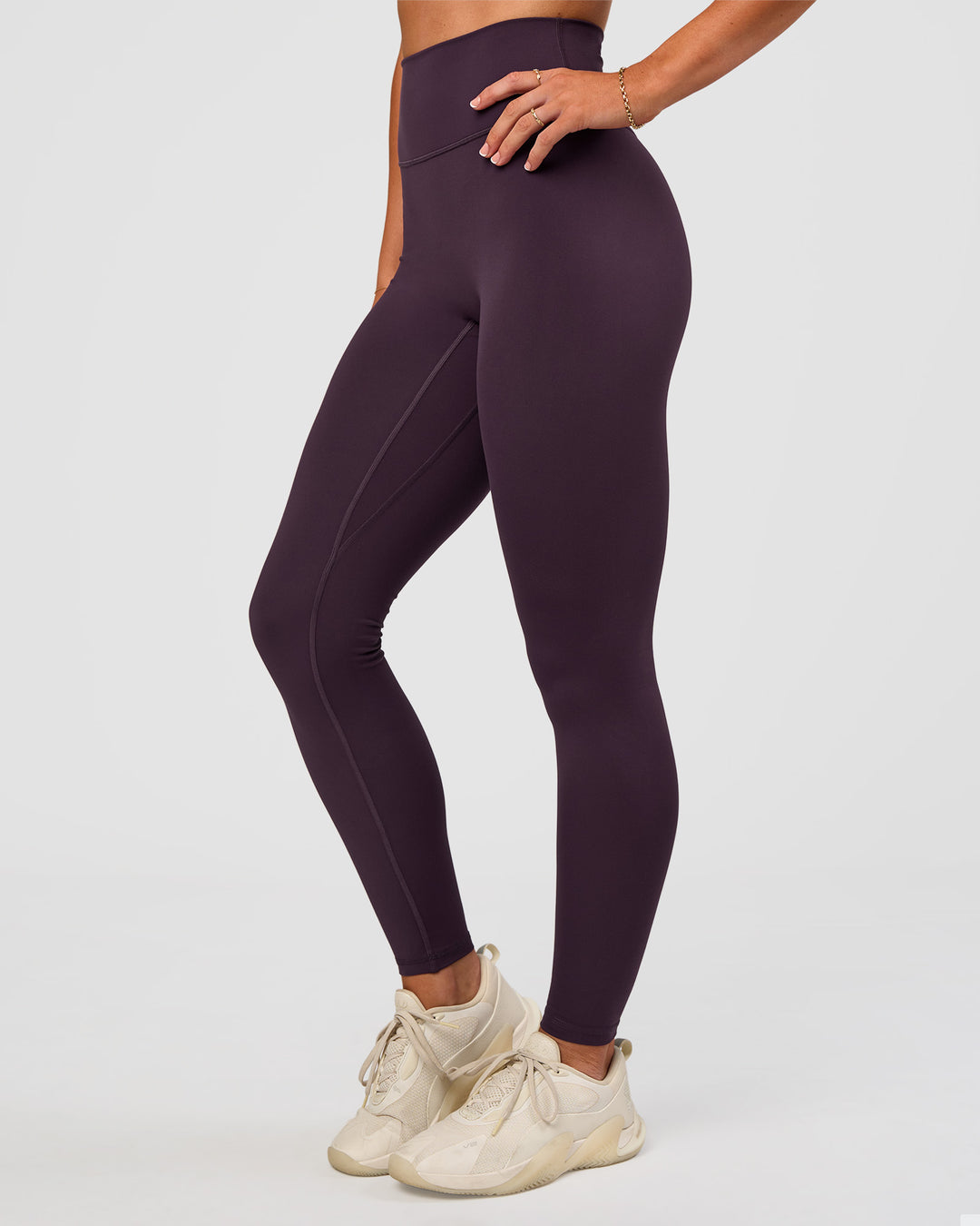 Woman wearing Fusion Ultra High-Rise Full Length Legging - Midnight Plum | Model:Emelia | Size:S - view 1