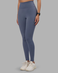 Woman wearing Fusion Ultra High-Rise Full Length Legging - Night Shadow | Model:Rhiley | Size:S | Thumbnail Index: 1