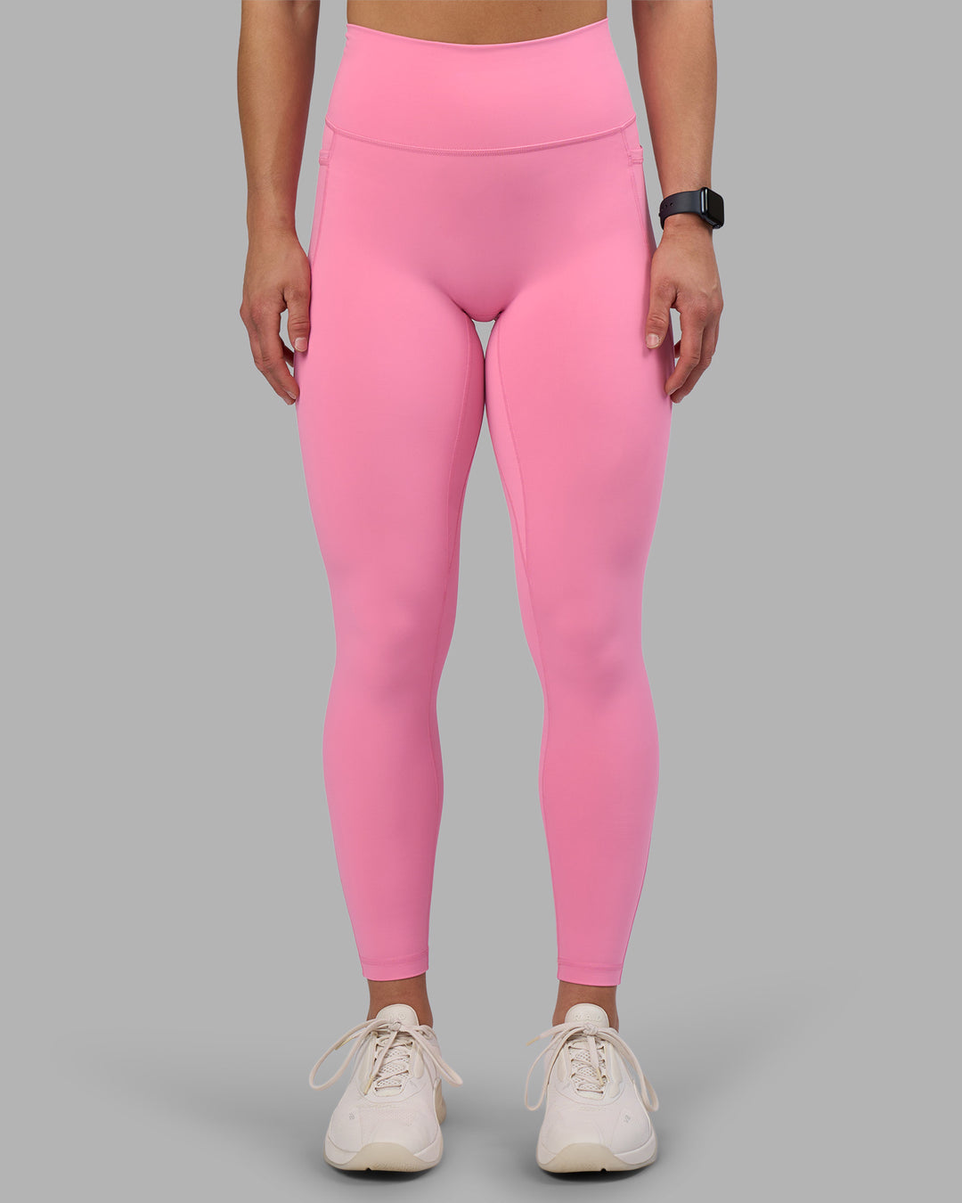 Woman wearing Fusion Ultra High-Rise Full Length Legging Pockets - Candy Pink | Model:Keisha | Size:S - view 1