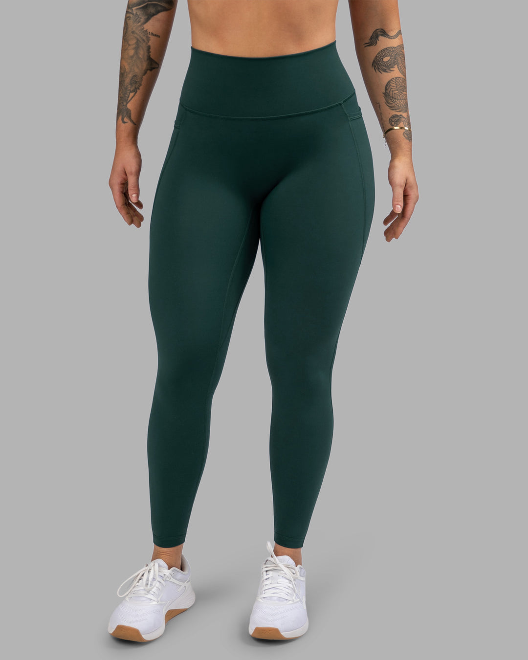Woman wearing Fusion Ultra High-Rise Full Length Legging Pockets - Dark Moss | Model:Robyn | Size:S - view 6