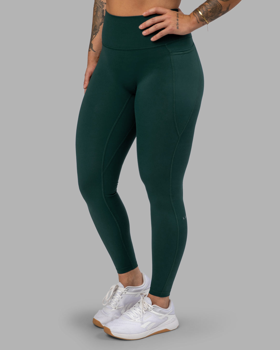 Woman wearing Fusion Ultra High-Rise Full Length Legging Pockets - Dark Moss | Model:Robyn | Size:S - view 9