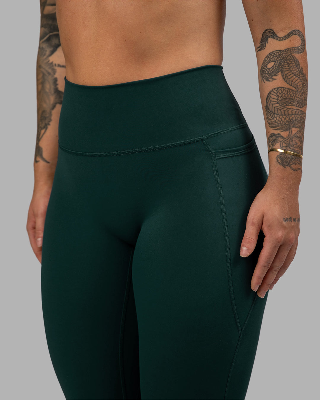 Woman wearing Fusion Ultra High-Rise Full Length Legging Pockets - Dark Moss | Model:Robyn | Size:S - view 8
