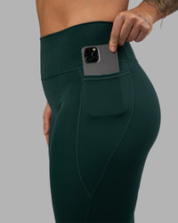 Woman wearing Fusion Ultra High-Rise Full Length Legging Pockets - Dark Moss | Model:Robyn | Size:S | Thumbnail Index: 6