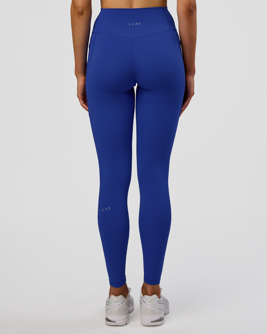 Woman wearing Fusion Ultra High-Rise Full Length Legging Pockets - Electric Indigo | Model:Evie | Size:S - view 4