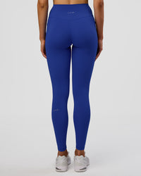 Woman wearing Fusion Ultra High-Rise Full Length Legging Pockets - Electric Indigo | Model:Evie | Size:S | Thumbnail Index: 3