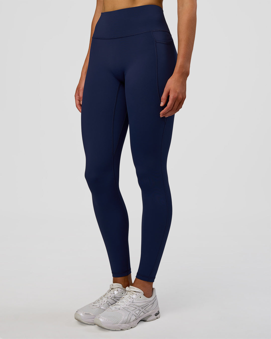 Woman wearing Fusion Ultra High-Rise Full Length Legging Pockets - Future Navy | Model:Evie | Size:S - view 6