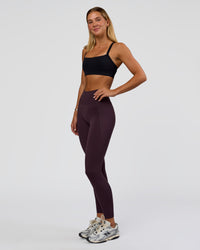 Woman wearing Fusion Ultra High-Rise Full Length Legging Pockets - Midnight Plum | Model:Amity | Size:S | Thumbnail Index: 5