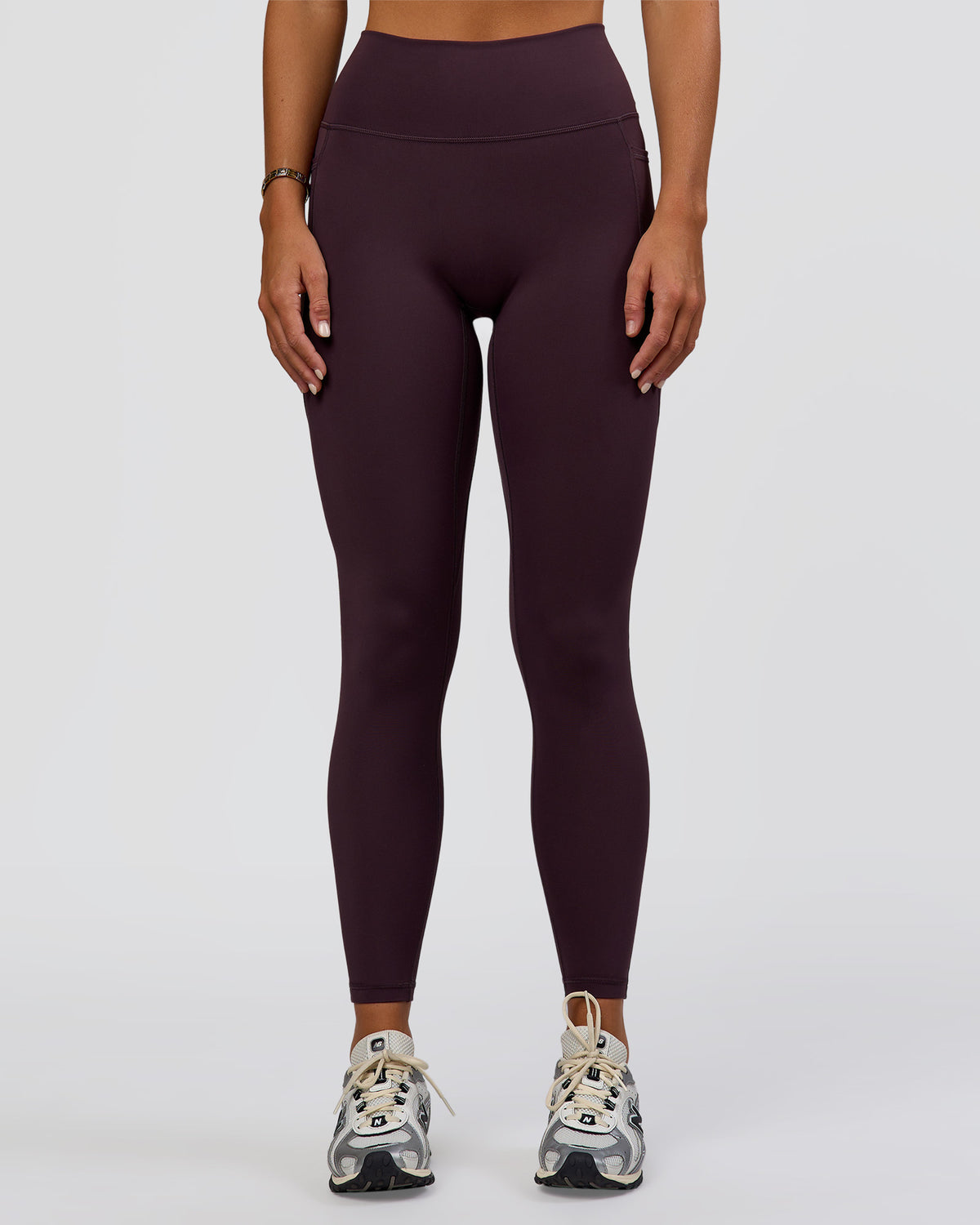 Woman wearing Fusion Ultra High-Rise Full Length Legging Pockets - Midnight Plum | Model:Amity | Size:S