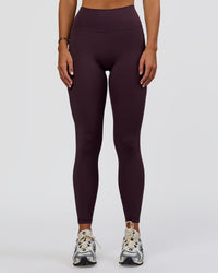Woman wearing Fusion Ultra High-Rise Full Length Legging Pockets - Midnight Plum | Model:Amity | Size:S | Thumbnail Index: 1