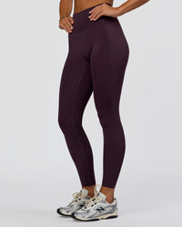 Woman wearing Fusion Ultra High-Rise Full Length Legging Pockets - Midnight Plum | Model:Amity | Size:S | Thumbnail Index: 0