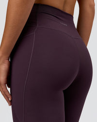 Woman wearing Fusion Ultra High-Rise Full Length Legging Pockets - Midnight Plum | Model:Amity | Size:S | Thumbnail Index: 6