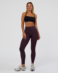 Woman wearing Fusion Ultra High-Rise Full Length Legging Pockets - Midnight Plum | Model:Amity | Size:S | Thumbnail Index: 4