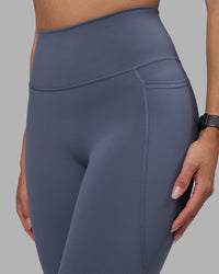 Woman wearing Fusion Ultra High-Rise Full Length Legging Pockets - Night Shadow | Model:Rhiley | Size:S | Thumbnail Index: 5