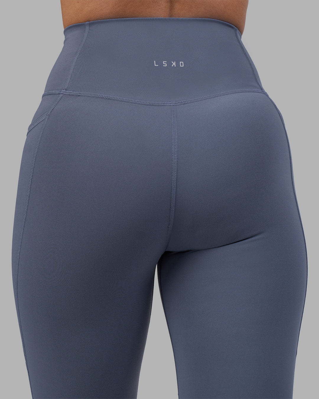 Woman wearing Fusion Ultra High-Rise Full Length Legging Pockets - Night Shadow | Model:Rhiley | Size:S - view 8