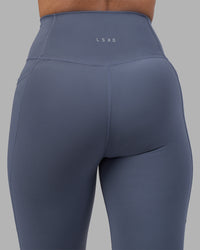 Woman wearing Fusion Ultra High-Rise Full Length Legging Pockets - Night Shadow | Model:Rhiley | Size:S | Thumbnail Index: 7