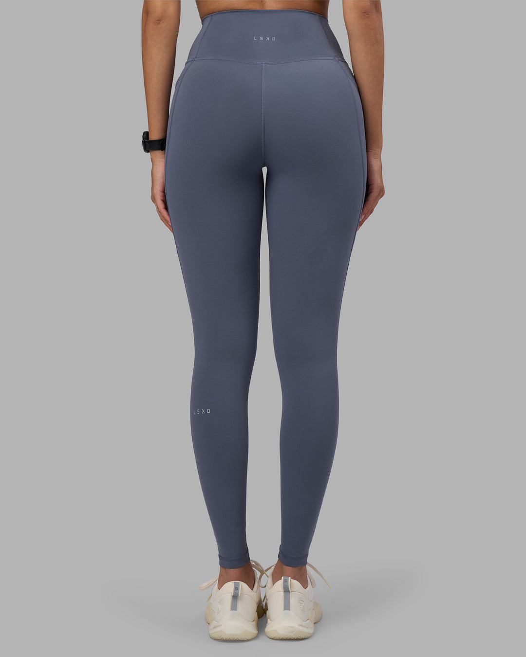 Woman wearing Fusion Ultra High-Rise Full Length Legging Pockets - Night Shadow | Model:Rhiley | Size:S - view 4