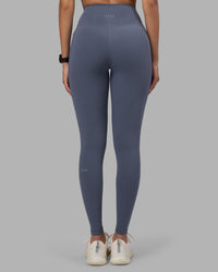 Woman wearing Fusion Ultra High-Rise Full Length Legging Pockets - Night Shadow | Model:Rhiley | Size:S | Thumbnail Index: 3