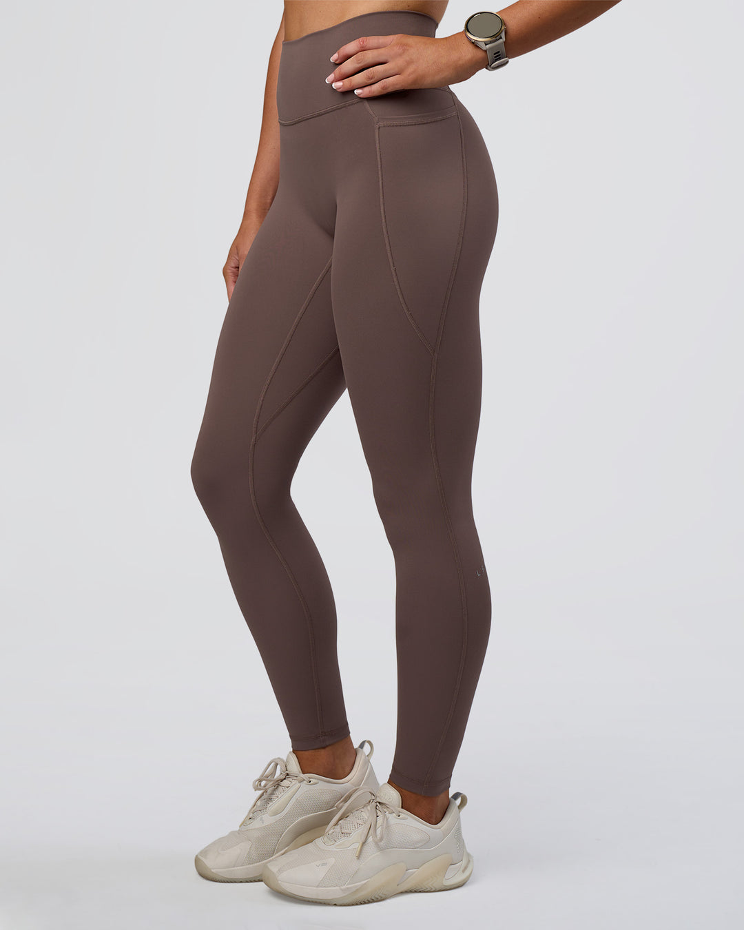 Woman wearing Fusion Ultra High-Rise Full Length Legging Pockets - Peppercorn | Model:Emelia | Size:S - view 1