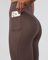 Woman wearing Fusion Ultra High-Rise Full Length Legging Pockets - Peppercorn | Model:Emelia | Size:S | Thumbnail Index: 2