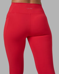 Woman wearing Fusion Ultra High-Rise Full Length Legging Pockets - Scarlet | Model:Sophie | Size:S | Thumbnail Index: 7