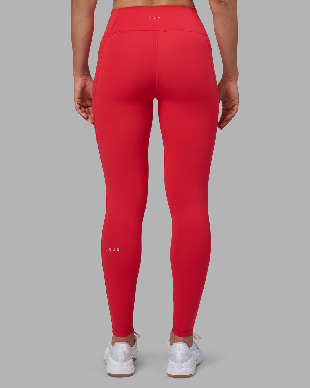 Woman wearing Fusion Ultra High-Rise Full Length Legging Pockets - Scarlet | Model:Sophie | Size:S - view 4