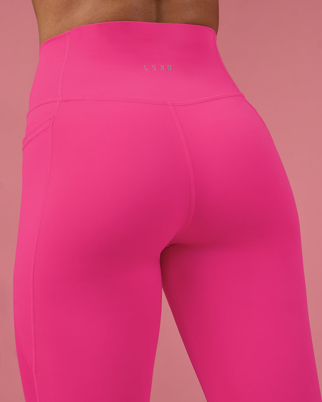Woman wearing Fusion Ultra High-Rise Full Length Legging Pockets - Ultra Pink | Model:Hannah | Size:S - view 9