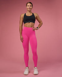 Woman wearing Fusion Ultra High-Rise Full Length Legging Pockets - Ultra Pink | Model:Hannah | Size:S | Thumbnail Index: 1