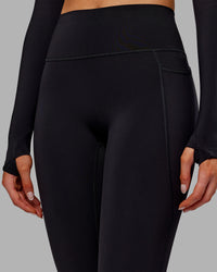 Woman wearing Fusion Ultra High-Rise Full Length Thermal Legging Pockets - Black | Model:Ella | Size:S | Thumbnail Index: 5