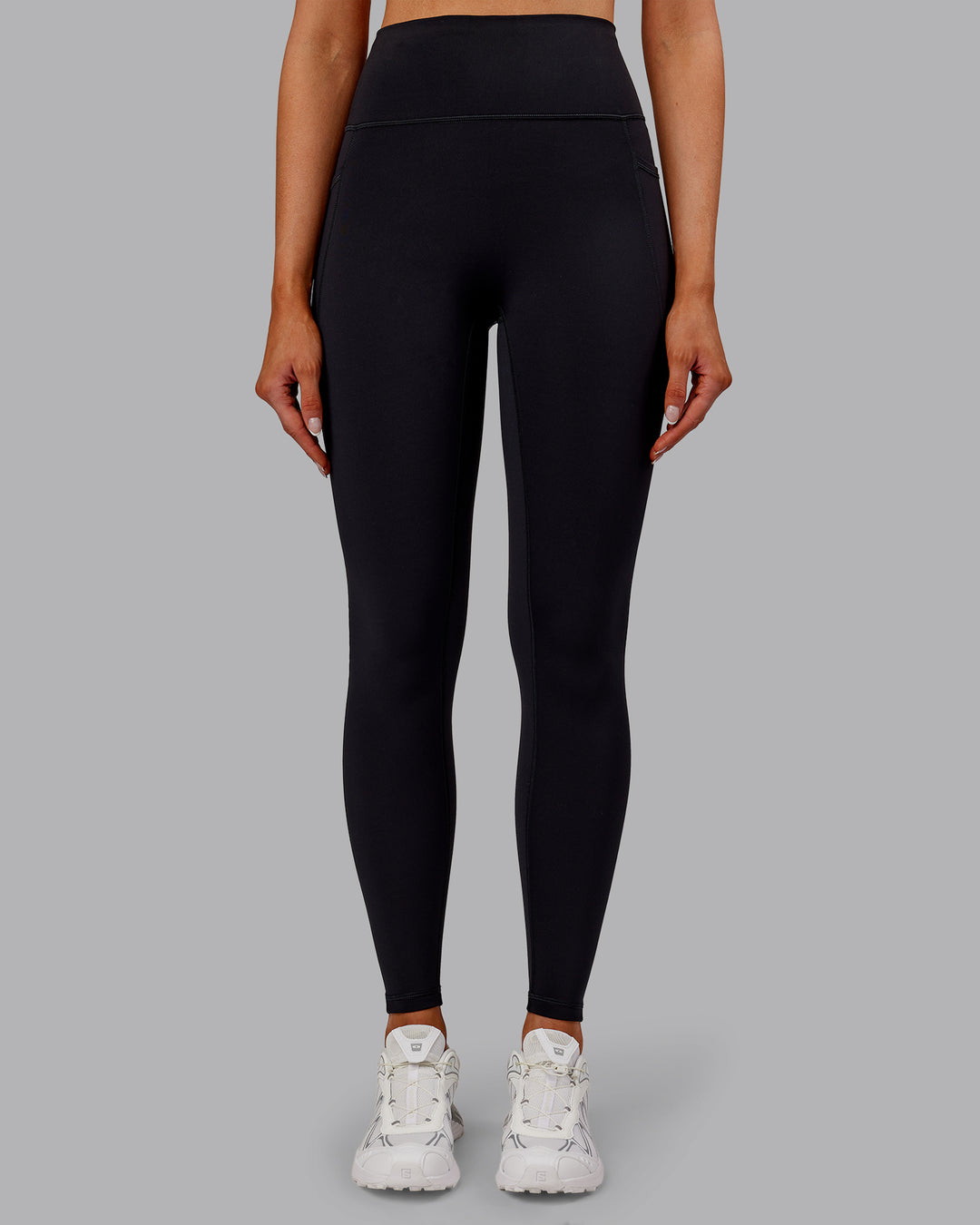 Woman wearing Fusion Ultra High-Rise Full Length Thermal Legging Pockets - Black | Model:Ella | Size:S - view 1