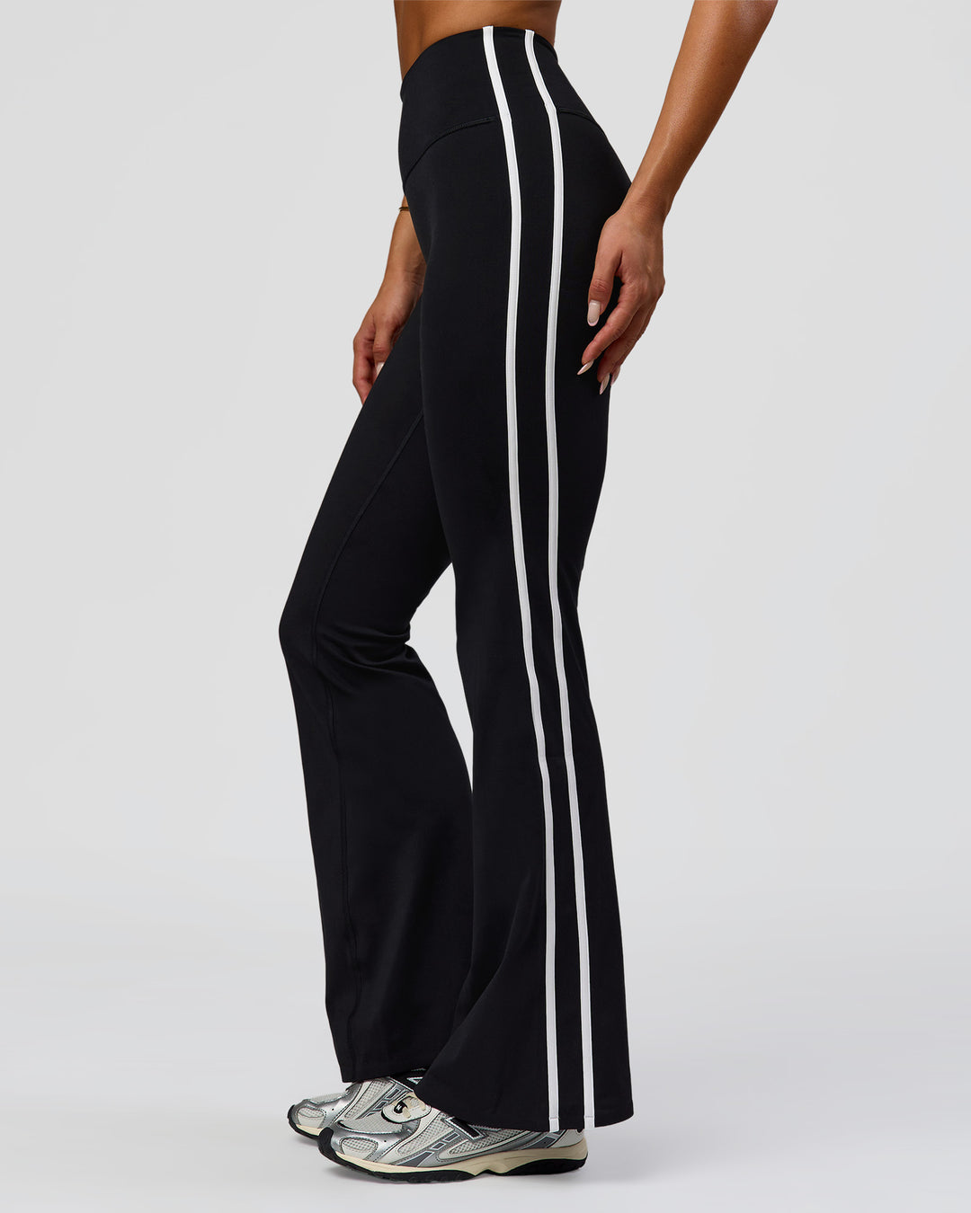 Woman wearing Fusion V-Contour Bind High-Rise Flared Legging - Black-white | Model:Bianca | Size:S - view 1