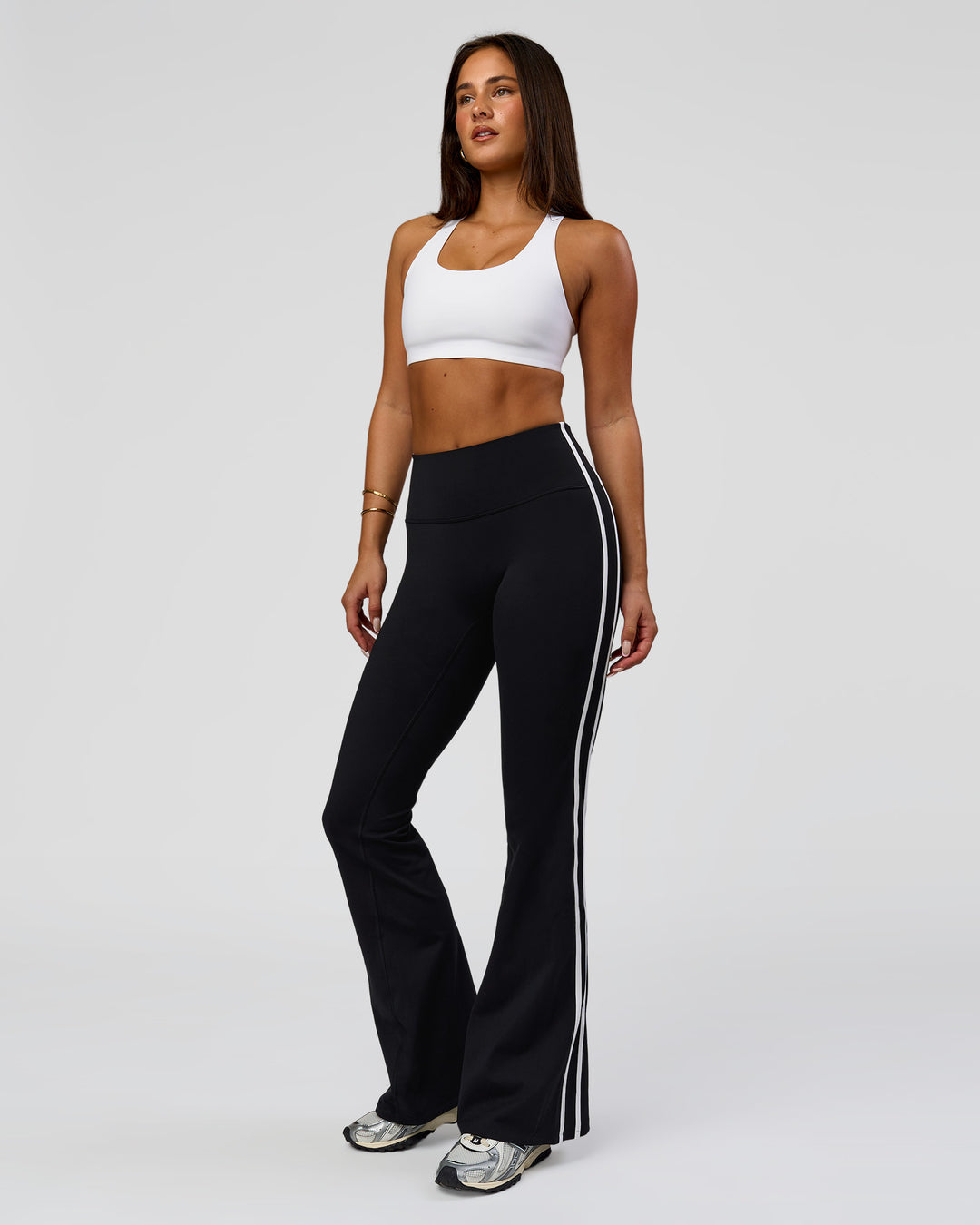 Woman wearing Fusion V-Contour Bind High-Rise Flared Legging - Black-white | Model:Bianca | Size:S - view 7