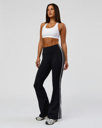 Woman wearing Fusion V-Contour Bind High-Rise Flared Legging - Black-white | Model:Bianca | Size:S | Thumbnail Index: 6