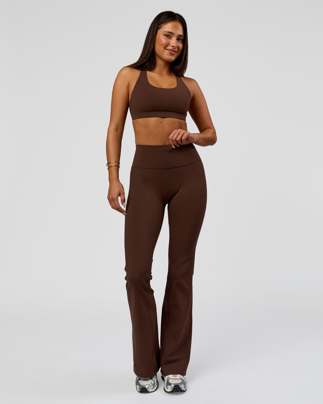 Woman wearing Fusion V-Contour Bind High-Rise Flared Legging - Hot Chocolate-white | Model:Bianca | Size:S - view 3