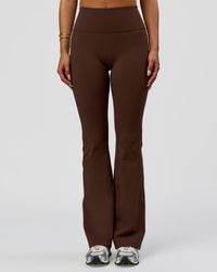 Woman wearing Fusion V-Contour Bind High-Rise Flared Legging - Hot Chocolate-white | Model:Bianca | Size:S | Thumbnail Index: 1