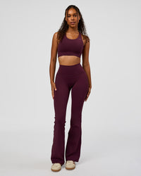 Woman wearing Fusion V-Contour High-Rise Flared Legging Pockets - Cherry Lacquer | Model:Jordan | Size:S | Thumbnail Index: 7