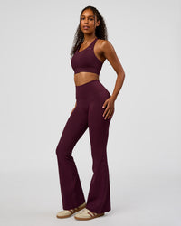 Woman wearing Fusion V-Contour High-Rise Flared Legging Pockets - Cherry Lacquer | Model:Jordan | Size:S | Thumbnail Index: 8