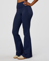 Woman wearing Fusion V-Contour High-Rise Flared Legging Pockets - Future Navy | Model:Jordan | Size:S | Thumbnail Index: 6