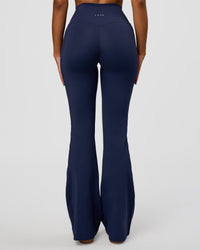 Woman wearing Fusion V-Contour High-Rise Flared Legging Pockets - Future Navy | Model:Jordan | Size:S | Thumbnail Index: 8