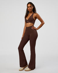 Woman wearing Woman wearing Fusion V-Contour High-Rise Flared Legging Pockets - Hot Chocolate | Model:Jordan | Size:S | Thumbnail Index: 7