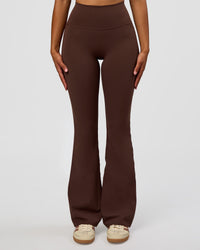 Woman wearing Woman wearing Fusion V-Contour High-Rise Flared Legging Pockets - Hot Chocolate | Model:Jordan | Size:S | Thumbnail Index: 8