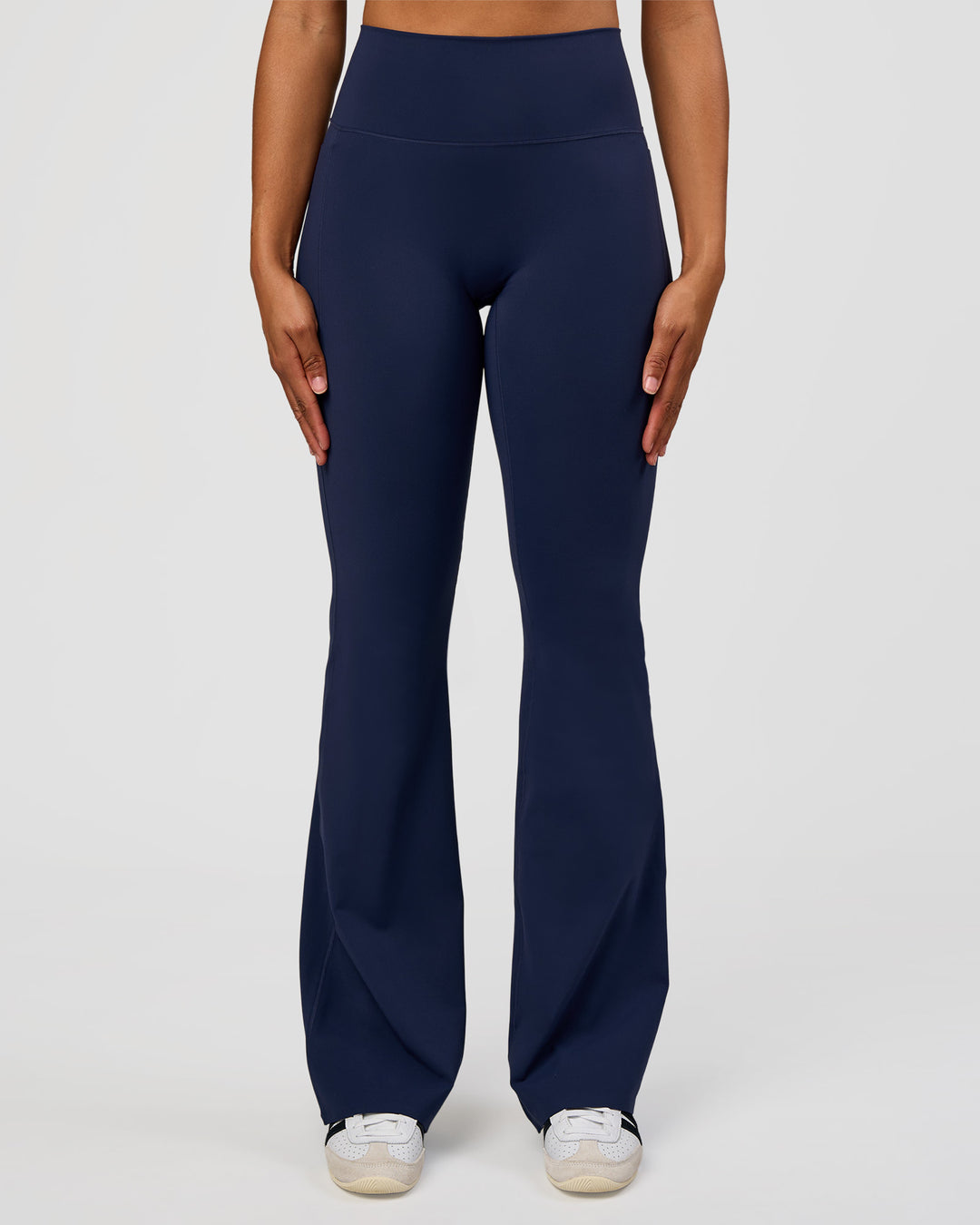 Woman wearing Fusion V-Contour High-Rise Flared Tall Legging Pockets - Future Navy | Model:Rosie | Size:S - view 7