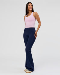 Woman wearing Fusion V-Contour High-Rise Flared Tall Legging Pockets - Future Navy | Model:Rosie | Size:S | Thumbnail Index: 8