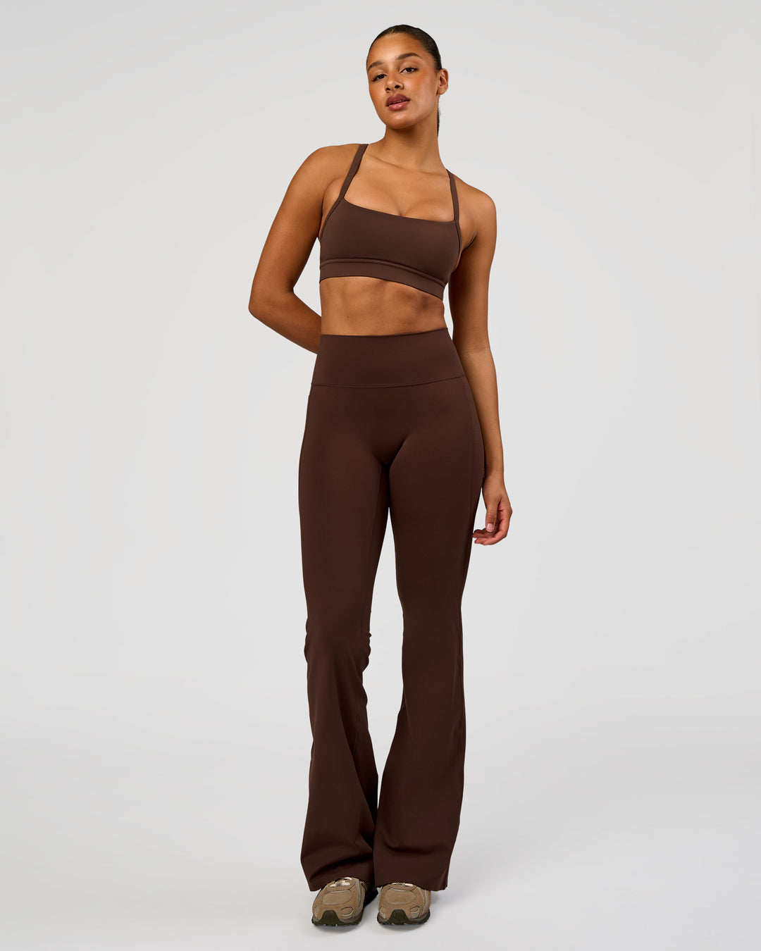 Woman wearing Fusion V-Contour High-Rise Flared Tall Legging Pockets - Hot Chocolate | Model:Rosie | Size:S - view 7