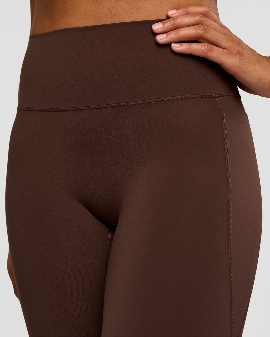 Woman wearing Fusion V-Contour High-Rise Flared Tall Legging Pockets - Hot Chocolate | Model:Rosie | Size:S - view 3