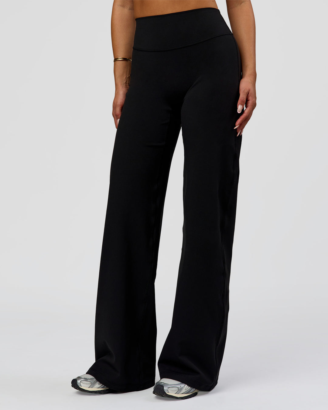 Woman wearing Fusion V-Contour High-Rise Pant - Black | Model:Bianca | Size:S - view 1