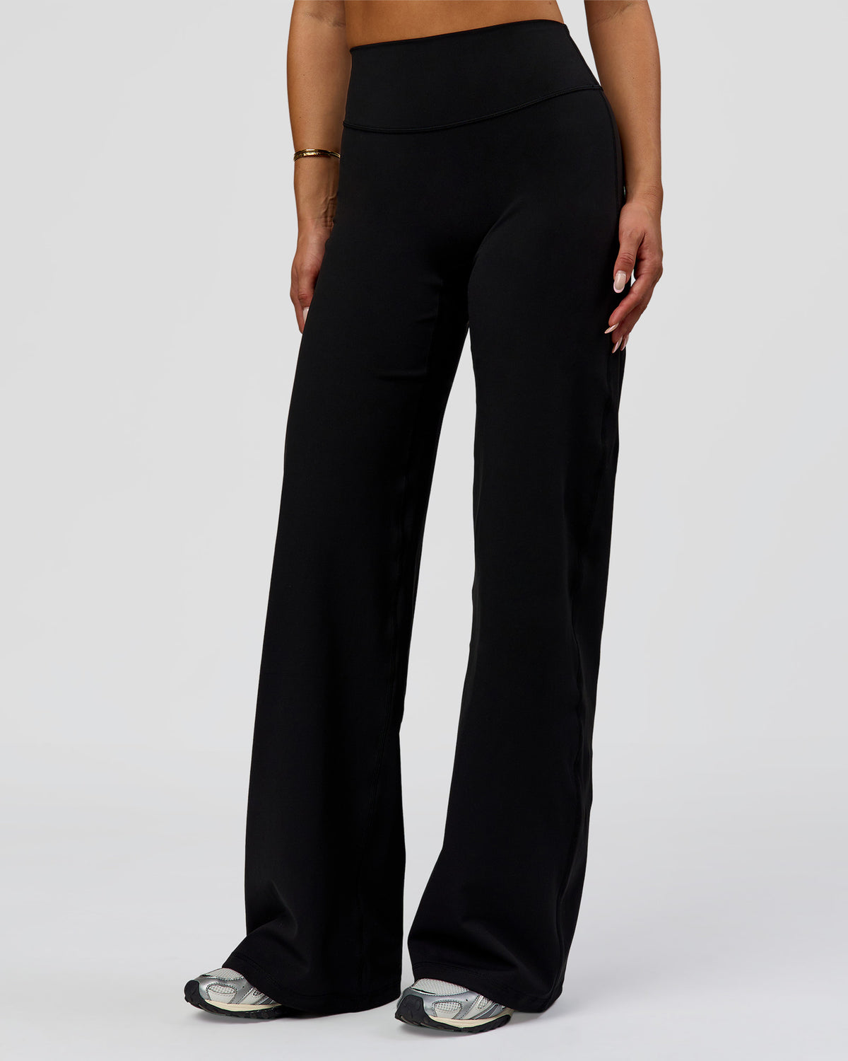 Woman wearing Fusion V-Contour High-Rise Pant - Black | Model:Bianca | Size:S