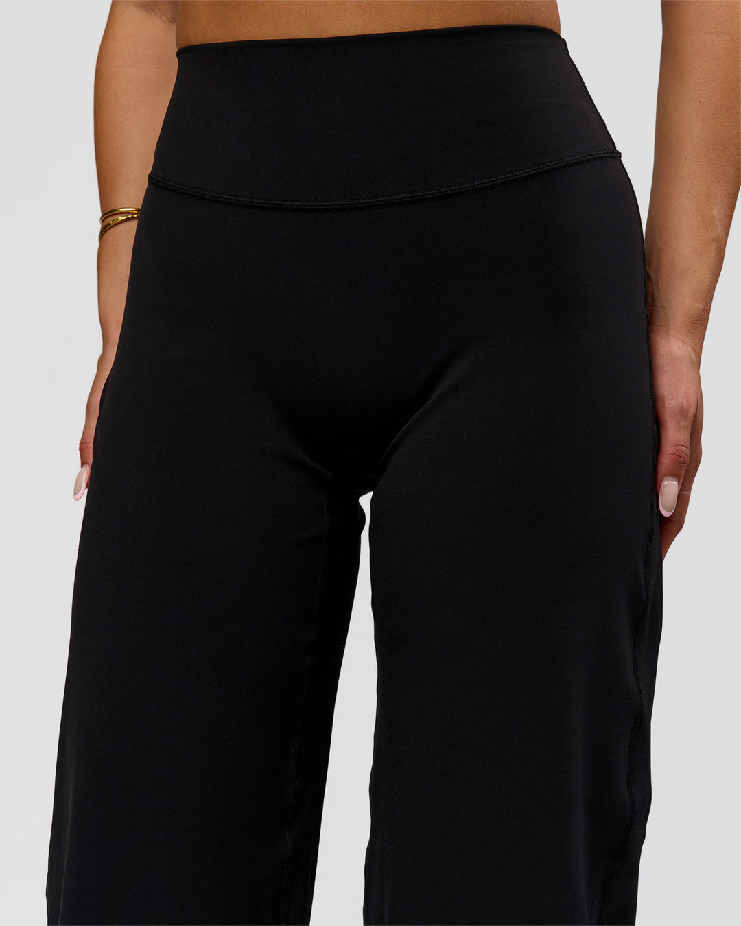 Woman wearing Fusion V-Contour High-Rise Pant - Black | Model:Bianca | Size:S - view 8