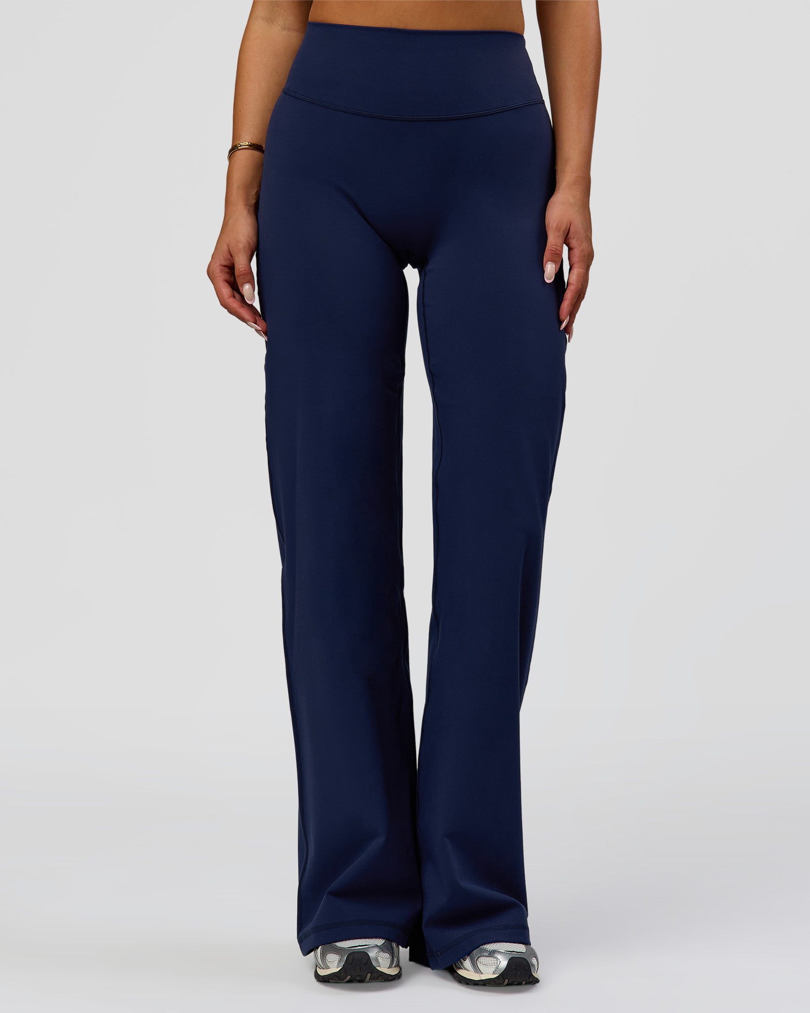Woman wearing Fusion V-Contour High-Rise Pant - Future Navy | Model:Bianca | Size:S