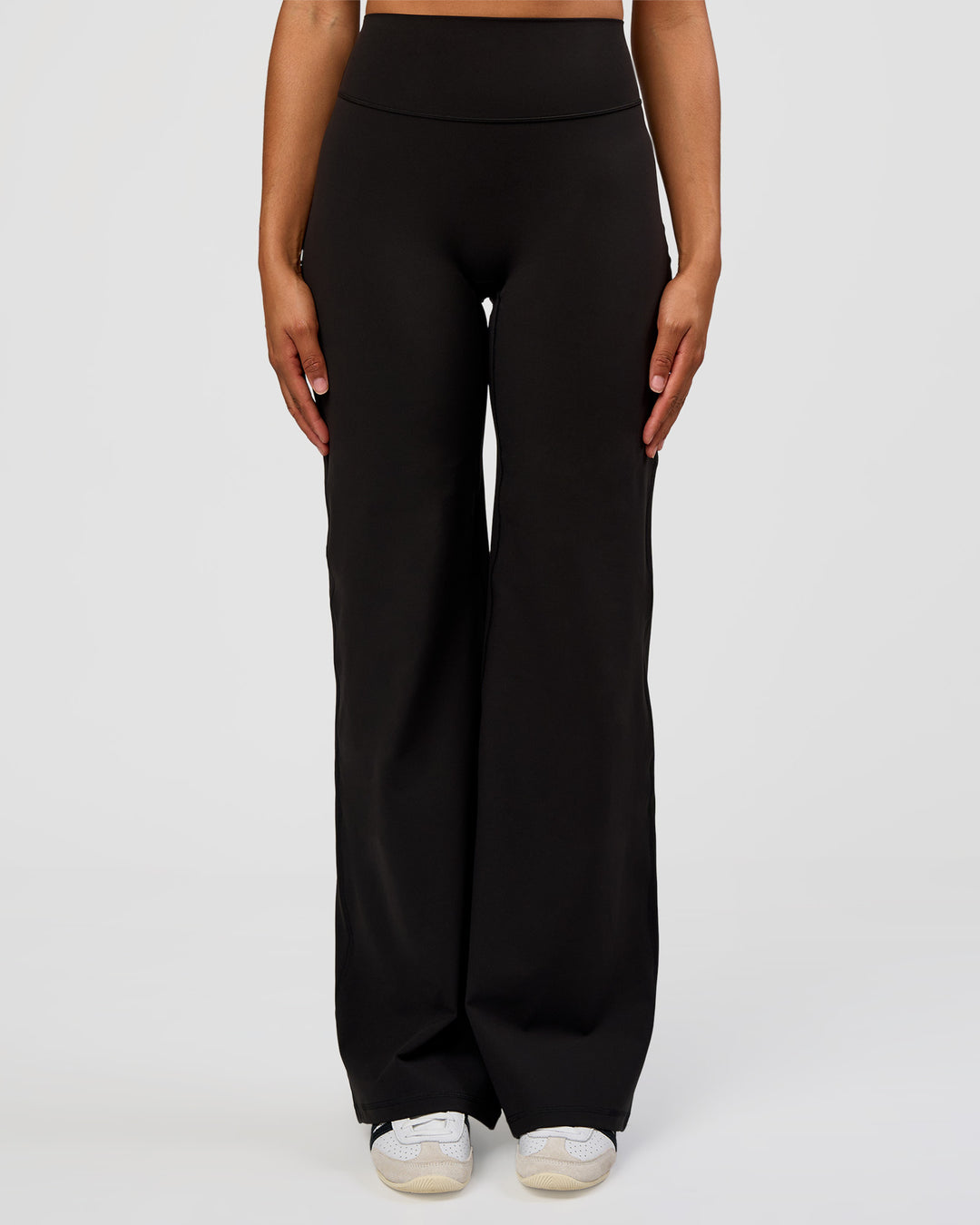 Woman wearing Fusion V-Contour High-Rise Tall Pant - Black | Model:Rosie | Size:S - view 1