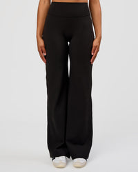 Woman wearing Fusion V-Contour High-Rise Tall Pant - Black | Model:Rosie | Size:S | Thumbnail Index: 0